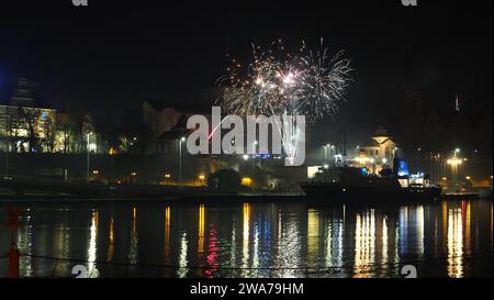 New Year's Eve Fireworks (2023-2024) at Way Chrobrego seen from across West Oder River, Szczecin Poland Stock Photo