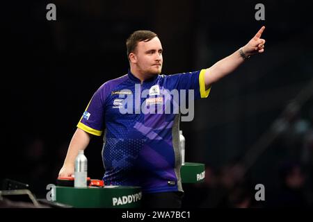 Luke Littler walks out to play Rob Cross (not pictured) on day fifteen of the Paddy Power World Darts Championship at Alexandra Palace, London. Picture date: Tuesday January 2, 2024. Stock Photo