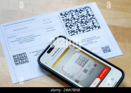 Symbolic image of an e-prescription, prescription issued by a doctor, with QR code, is scanned using a mobile phone and a special app, the code is the Stock Photo