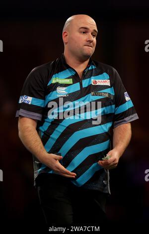 Luke Littler and Rob Cross after their semifinal during the BetMGM Premier League Darts Night 6