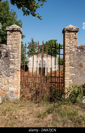 A small derelict cemetery near the Cellole monastery in the beautiful landscape of the Tuscany, Italy Stock Photo