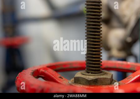 The interior of a mechanical room and a domestic potable water system with valves and connecting pipes. Stock Photo