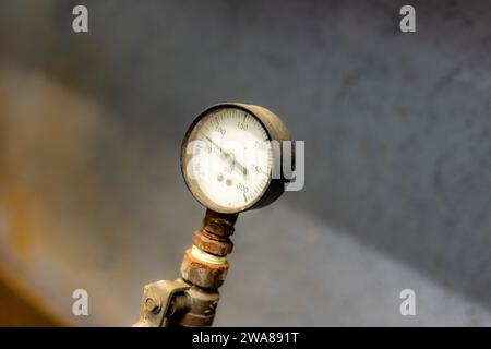 The interior of a mechanical room and a domestic potable water system with pressure gauge. Stock Photo