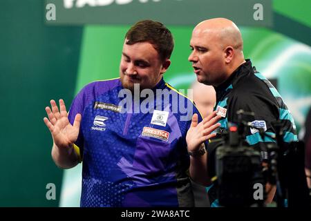 Luke Littler and Rob Cross after their semifinal during the BetMGM Premier League Darts Night 6