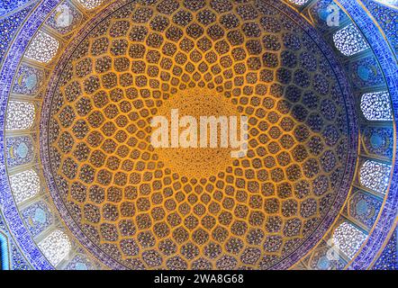 Intricate artwork of the interior ceiling the dome of the Sheikh Lotfollah Mosque, one of the masterpieces of Iranian architecture Stock Photo