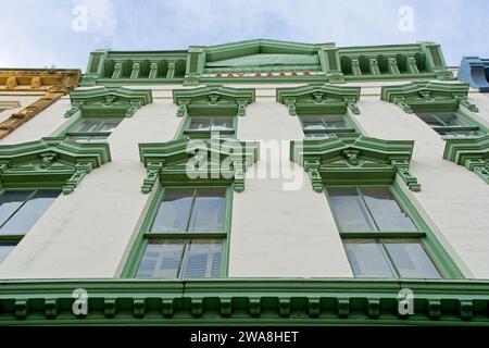 1840’s commercial ‘dry goods’ store,  cast-iron pediment on ornate facade on  Meeting street, Charleston South Carolina Stock Photo