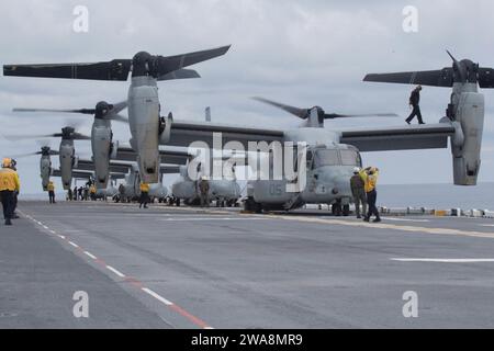US military forces. 170903GQ832-074 ATLANTIC OCEAN (Sept. 3, 2017)  Marines assigned to the 26th Marine Expeditionary Unit (26th MEU), and Sailors unload MV-22B Osprey aircraft assigned to Marine Medium Tiltrotor Squadron (VMM) 162 (Reinforced), aboard the amphibious assault ship USS Kearsarge (LHD 3) in the Atlantic Ocean, Sep. 3, 2017. Approximately 690 Marines and Sailors with the 26th MEU embarked aboard the amphibious assault ship as part of prudent measures in anticipation of future tasking to support Hurricane Irma relief efforts. (U.S. Marine Corps photo by Lance Cpl. Alexis C. Schneid Stock Photo