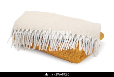 Stack of folded warm blankets isolated on white Stock Photo