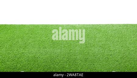 Green artificial grass surface isolated on white Stock Photo