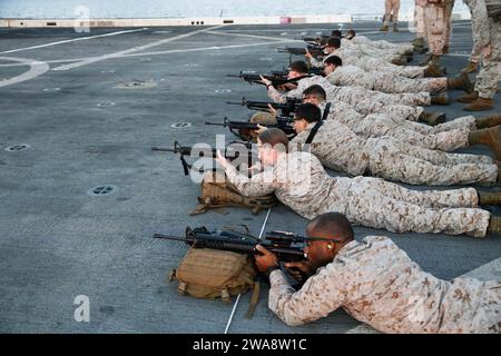 US military forces. 171011CK339-039 MEDITERRANEAN SEA (Oct. 11, 2017) – Marines assigned to the 15th Marine Expeditionary Unit’s (MEU), Aviation Combat Element, fire at targets during a deck shoot aboard the San Antonio-class amphibious transport dock ship USS San Diego (LPD 22), Oct. 11, 2017. The 15th MEU perform deck shoots to remain proficient with their weapons and be prepared as a maritime crisis-contingency force. San Diego is deployed with the America Amphibious Ready Group and 15th MEU to support maritime security operations and theater security cooperation efforts in the U.S. 6th Fle Stock Photo