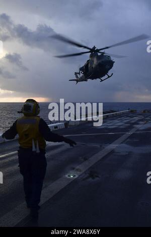 US military forces. 171101BK384-110 MEDITERRANEAN SEA (Nov. 1, 2017) Aviation Boatswain’s Mate (Handling) 3rd Class Esmerelda Hernandez, from Corpus Christi, Texas, directs a UH-1Y Venom helicopter, attached to Marine Medium Tiltrotor Squadron (VMM) 161 (reinforced), on the flight deck of the San Antonio-class amphibious transport dock ship USS San Diego (LPD 22) Nov. 1, 2017. San Diego is deployed with the America Amphibious Ready Group and the 15th Marine Expeditionary Unit to support maritime security and theater security cooperation in efforts in the U.S. 6th Fleet area of operations. (U.S Stock Photo