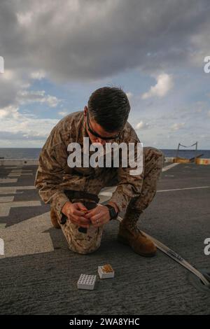 US military forces. 171210CK339-182 MEDITERRANEAN SEA (Dec. 10, 2017) – Staff Sgt. Charles Bourne, assigned to the 15th Marine Expeditionary Unit’s (MEU) Combat Cargo, loads a pistol magazine during a small arms gun shoot aboard the San Antonio-class amphibious transport dock ship USS San Diego (LPD 22), Dec. 10, 2017. Pistol training ensures Marines and Sailors stay proficient and ready as a crisis-contingency force. San Diego is deployed with the America Amphibious Ready Group and 15th MEU to support maritime security operations and theater security cooperation efforts in the U.S. 6th Fleet Stock Photo