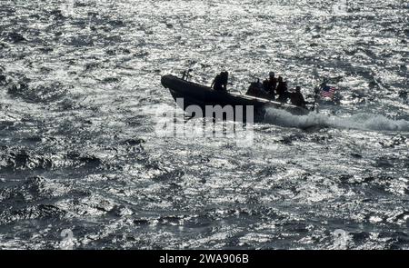 US military forces. ATLANTIC OCEAN (Jan. 14, 2018) A rigid-hull inflatable boat attached to the Arleigh Burke-class guided-missile destroyer USS Ross (DDG 71) practices tactical maneuvers during a visit, board, search and seizure drill Jan. 14, 2018. Ross, forward-deployed to Rota, Spain, is on its sixth patrol in the U.S. 6th Fleet area of operations in support of regional allies and partners and U.S. national security interests in Europe and Africa. (U.S. Navy photo by Mass Communication Specialist 1st Class Kyle Steckler/Released) Stock Photo