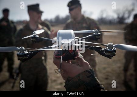 US military forces. 180310NZ408-0291  CAPU MIDIA TRAINING AREA, Romania (March 10, 2018) A Marine holds up an MK-2 Instant Eye quadcopter unmanned aerial system during exercise Spring Storm 2018, Capu Midia Training Area, Romania, March 10, 2018. Spring Storm is a Romanian-led exercise in the Black Sea to enhance amphibious operations and staff interoperability between Romanian and U.S. naval forces.  (U.S. Marine Corps photo by Cpl. Austin Livingston/Released) Stock Photo