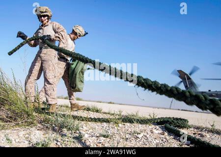 US military forces. HAIFA (Mar. 12, 2018) U.S. Marine 1st Lt. David M. Delong, left, a platoon commander assigned to the Tactical Recovery of Aircraft Personnel (TRAP) team, 26th Marine Expeditionary Unit (MEU), pulls in a cable to use for live fast-roping training, Haifa, Israel, Mar. 12, 2018. Iwo Jima and the 26th MEU are conducting naval operations in the U.S. 6th Fleet area of operations. (U.S. Marine Corps photo by Lance Cpl. Tojyea G. Matally/Released) Stock Photo
