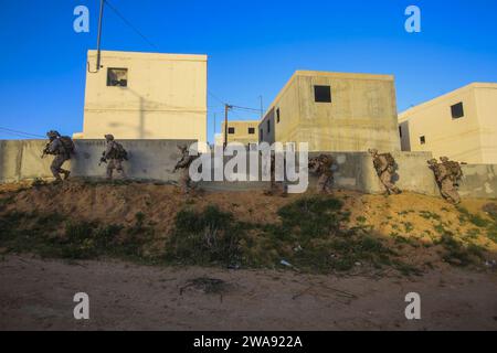 US military forces. NATIONAL TRAINING CENTER, ISRAEL (March 13, 2018) U.S. Marines assigned to the Battalion Landing Team, 2nd Battalion, 6th Marine Regiment (BLT 2/6), 26th Marine Expeditionary Unit (MEU), maneuver around a building during exercise Juniper Cobra 2018 at the National Training Center in Israel, March 13, 2018. Juniper Cobra is a computer-assisted exercise conducted through computer simulations focused on improving combined missile defense capabilities and overall interoperability between the U.S. European Command and Israel Defense Force. (U.S. Marine Corps photo by Cpl. Jon So Stock Photo