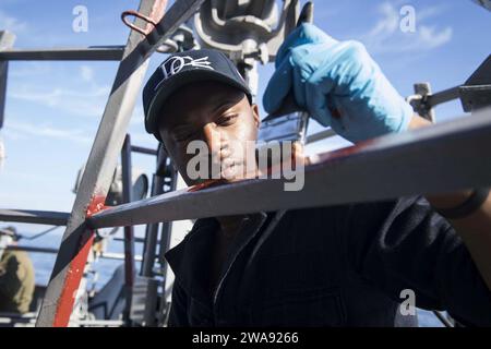 US military forces. 180316KP948-115 MEDITERRANEAN SEA (March 16, 2018) Quartermaster Seaman Marquise Hammond paints aboard the Arleigh Burke-class guided-missile destroyer USS Donald Cook (DDG 75) March 16, 2018.  Donald Cook, forward-deployed to Rota, Spain, is on its seventh patrol in the U.S. 6th Fleet area of operations in support of regional allies and partners, and U.S. national security interests in Europe and Africa. (U.S. Navy photo by Mass Communication Specialist 2nd Class Alyssa Weeks/Released) Stock Photo
