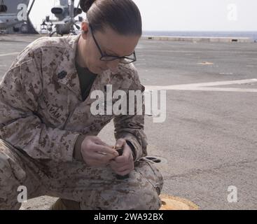 US military forces. 180323GR168-0013 MEDITERRANEAN SEA (March 23, 2018) Chief Hospital Corpsman Denise Galvan, from Goose Creek, South Carolina, assigned to the Combat Landing Battalion, 26th Marine Expeditionary Unit, loads ammunition for a gun shoot on the flight deck of the San Antonio-class amphibious transport dock ship USS New York (LPD 21) March 23, 2018. New York, homeported in Mayport, Florida, is conducting naval operations in the U.S. 6th Fleet area of operations. (U.S. Navy photo by Mass Communication Specialist 2nd Class Lyle Wilkie/Released) Stock Photo