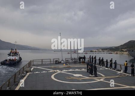 US military forces. 180520KP946-0071 NAVAL SUPPORT ACTIVITY SOUDA BAY, Greece  (May 20, 2018) Sailors man the rails aboard the Arleigh Burke-class guided-missile destroyer USS Donald Cook (DDG 75) as the ship departs Naval Support Activity Souda Bay, Greece, May 20, 2018. Donald Cook, forward-deployed to Rota, Spain, is on its seventh patrol in the U.S. 6th Fleet area of operations in support of regional allies and partners, and U.S. national security interests in Europe and Africa. (U.S. Navy photo by Mass Communication Specialist 2nd Class Alyssa Weeks / Released) Stock Photo