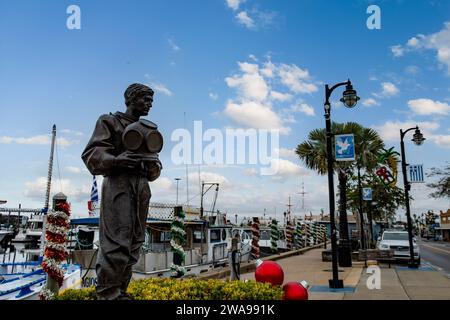 A statue of a sponge diver on the docks at Tarpon Springs, Florida, USA Stock Photo