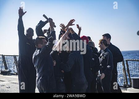 US military forces. 180613JI086-457 MEDITERRANEAN SEA (June 13, 2018) Sailors assigned to repair locker 3 aboard the Arleigh Burke-class guided-missile destroyer USS Porter (DDG 78) celebrate winning the ship’s annual damage control olympics, June 13, 2018. Porter, forward-deployed to Rota, Spain, is on its fifth patrol in the U.S. 6th Fleet area of operations in support of U.S. national security interests in Europe and Africa. (U.S. Navy photo by Mass Communication Specialist 2nd Class Ford Williams/Released) Stock Photo