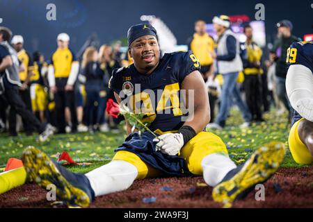 Michigan Wolverines defensive lineman Kris Jenkins (94) celebrates a victory after winning the CFP Semifinal at the Rose Bowl Game against the Alabama Stock Photo