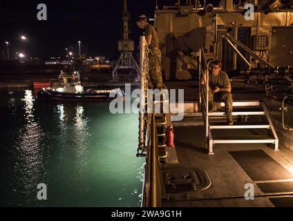 US military forces. POTI, Georgia (Aug. 18, 2018) U.S. Army Soldiers assigned to Bravo Company, 2nd Battalion, 5th Cavalry Regiment, 1st Armored Brigade Combat Team, 1st Cavalry Division, wait aboard the Spearhead-class expeditionary fast transport ship USNS Carson City (T-EPF 7) as the ship departs Poti, Georgia, Aug. 18, 2018. Carson City is the seventh of nine expeditionary fast transport ships in Military Sealift Command's inventory with a primary mission of providing rapid transport of military equipment and personnel in theater via its 20,000 square foot reconfigurable mission bay area a Stock Photo