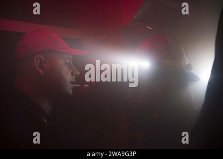 US military forces. 180825EV253-132 ATLANTIC OCEAN (Aug. 25, 2018) Damage Controlman 1st Class Troy Baran, a chief select, trains Hull Maintenance Technician 3rd Class Adrian Mendez during a general quarters drill aboard the Arleigh Burke-class guided-missile destroyer USS Bulkeley (DDG 84) Aug. 25, 2018. Bulkeley, homeported at Naval Station Norfolk, is conducting naval operations in the U.S. 6th Fleet area of operations in support of U.S. national security interests in Europe and Africa. (U.S. Navy photo by Mass Communication Specialist 3rd Class Sara Eshleman/Released) Stock Photo