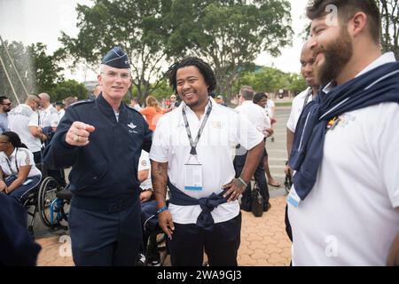 US military forces. U.S. Air Force Gen. Paul J. Selva, Vice Chairman of the Joint Chiefs of Staff, and his wife Mrs. Ricki Selva meet with Team U.S. competitors, families, and staff before the Invictus Games Sydney 2018 Opening Ceremony in Sydney, New South Wales, Australia; Oct. 20, 2018. The Invictus Games are an international adaptive sporting event with current and former wounded, ill, or injured service members from 18 nations competing in 12 adaptive sports including; archery, athletics, indoor rowing, powerlifting, road cycling, driving challenge, sailing, sitting volleyball, swimming, Stock Photo