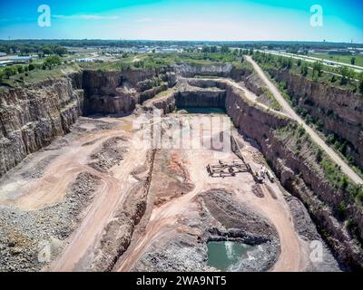 Open pit view of a quartzite rock quarry in Sioux Falls, South Dakota Stock Photo