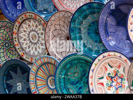 Beautiful and colorful ceramic plates for sale in Marrakech, Morocco. Stock Photo