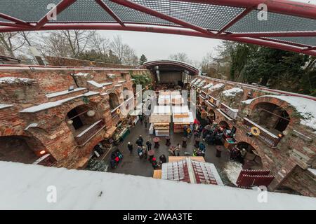 Christmas market on top of schlossberg hill in Graz, Austria. Market in the old theatre on top at the castle hill above graz, daztime setting. Venue o Stock Photo