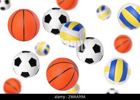 Many balls for different sports flying on white background Stock Photo