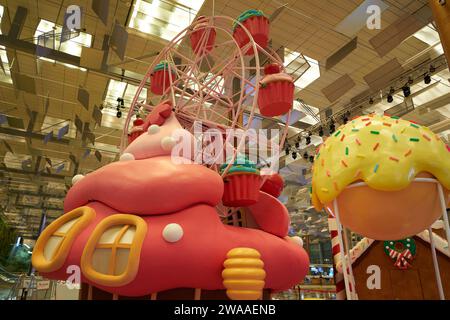 SINGAPORE - NOVEMBER 07, 2023: Christmas decorations in Singapore Changi Airport Terminal 3 Departure Hall. Stock Photo