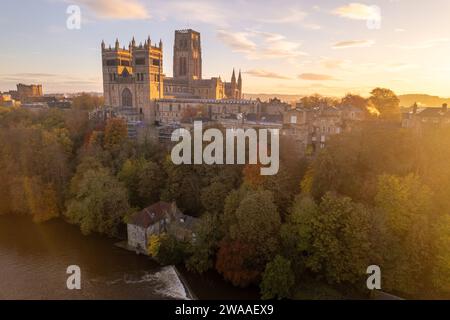 Stunning dawn aerial shot of Durham Cathedral and the river Wear at the height of Autumn Stock Photo