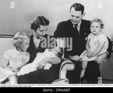 Queen Margrethe II of Denmark.  Pictured with her mother and father, Ingrid of Sweden and king Frederick IX of Denmark. Princess Benedikte in her fathers knee. Princess Anne-Marie in Ingrids arms.  1946 Stock Photo