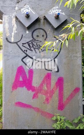 UK, England, Greater London, near Harefield, Graffiti on Concrete Post next to the Grand Union Canal Tow-Path Stock Photo