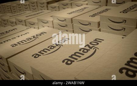 Poznan, Poland, January 2, 2024: Amazon e-commerce box production line. E-business and online retail company. Cardboard pack factory. Abstract concept Stock Photo