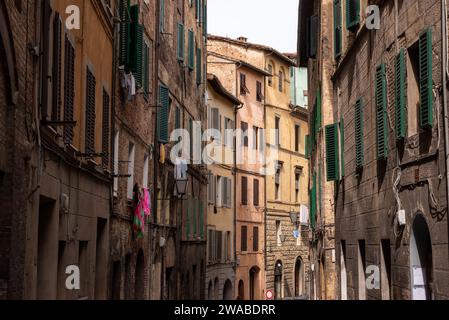Somewhere in the streets of the old medieval Siena, Italy Stock Photo
