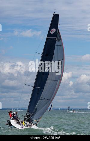 GBR005 Moral Compass a Farr 280 Racing Yacht on her way to first place in her class at the Cowes Week Regatta held in the Solent each summer. Stock Photo