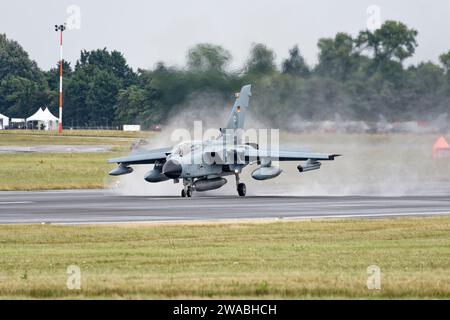 German Air Force Luftwaffe Eurofighter EF2000 Typhoon 4514 from the Taktisches Luftwaffengeschwader 33 lands on a wet RAF Fairford runway at RIAT Stock Photo