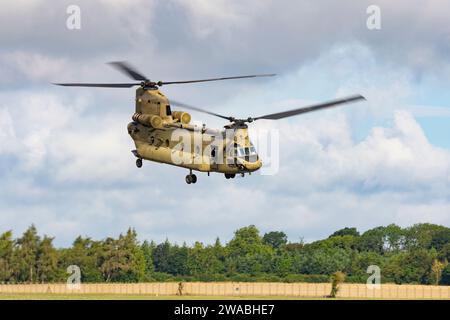 Boeing CH-47F Chinook Helicopter D-483 of 298 Squadron Netherlands Royal Air Force departs RAF Fairford in Southern England after the RIAT Stock Photo