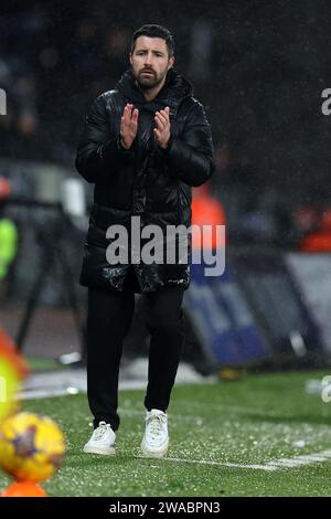 Alan Sheehan, the caretaker head coach of Swansea City reacts during ...