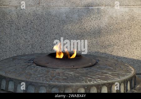 The Eternal Flame at the Monument or Grave to the Unknown Warrior, built in 1981 on the south side of the early Christian church 'St. Sofia' in Sofia, Stock Photo