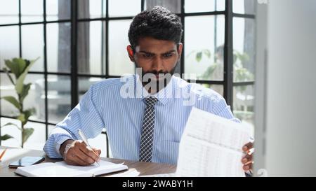 conference taking notes, doing market research working in office. Stock Photo