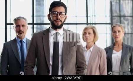 Business team and a leader, business man with his colleagues Stock Photo