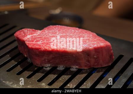 Japanese wagyu meat / steak, expensive delicacy also called Matsusaka beef / Kobe beef / Yonezawa beef on the grill, Tokyo, Japan Stock Photo