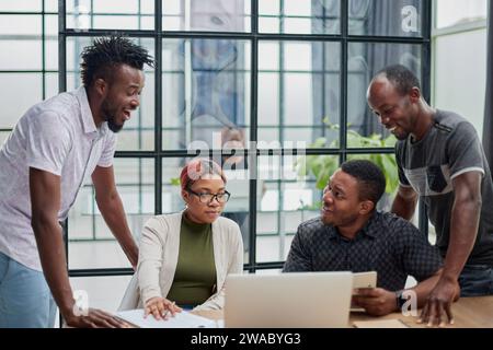 Business people collaborating in office and working on project together Stock Photo