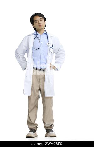The guy is a doctor, on a white background, in full height, Hands on the belt Stock Photo