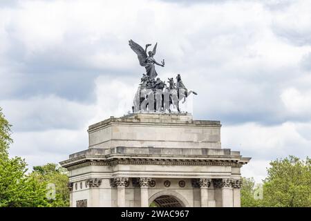 London, UK - May 23, 2023:  The Wellington Arch, also known as the Constitution Arch or the Green Park Arch, is a triumphal arch that forms a centrepi Stock Photo